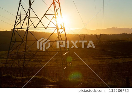 The evening electricity pylon silhouette 133286783