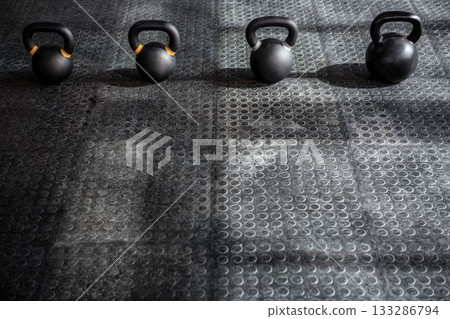 High angle view of kettlebells High angle view of kettlebells 133286794