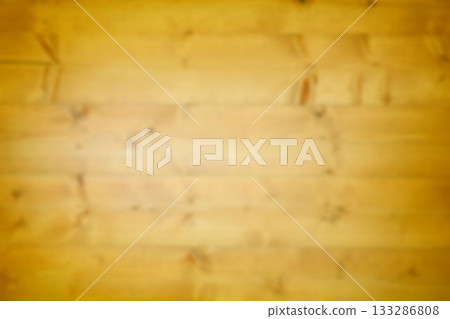 Blurred horizontal wooden plank surface is showing in flat design, featuring grain lines and knots 133286808