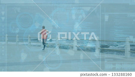 Running man in red top on walkway by waves, with white railing, HUD overlay, copy space Running man in red top on walkway by waves, with white railing, HUD overlay, copy space 133288160