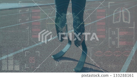 Teenage athlete wearing black leggings running in red track lane, with carbon-fiber blades and HUD 133288161