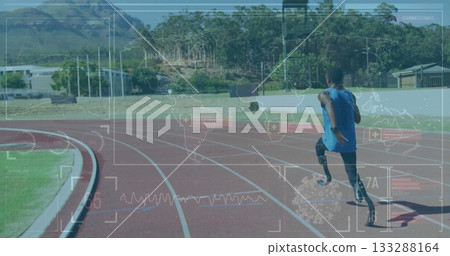 Speeding teen sprinter wearing prosthetic blades rounding red track with data overlay, copy space Speeding teen sprinter wearing prosthetic blades rounding red track with data overlay, copy space 133288164