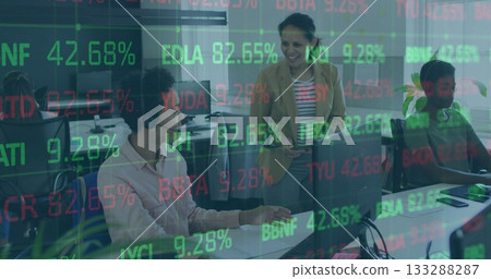 Smiling woman in tan blazer with tablet guiding colleagues in office, with stock ticker overlay Smiling woman in tan blazer with tablet guiding colleagues in office, with stock ticker overlay 133288287