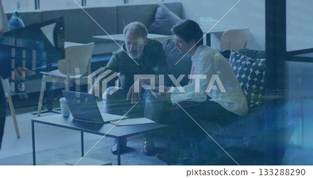 Pointing and checking smartphone two colleagues working in office lounge, with laptop, clapperboard Pointing and checking smartphone two colleagues working in office lounge, with laptop, clapperboard 133288290