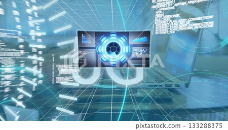 Displaying 5G network interface on desk in tech workspace, with monitor and floating code snippets 133288375