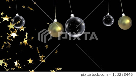Hanging five ornaments against black backdrop, featuring glass baubles, gold spheres, star confetti Hanging five ornaments against black backdrop, featuring glass baubles, gold spheres, star confetti 133288446
