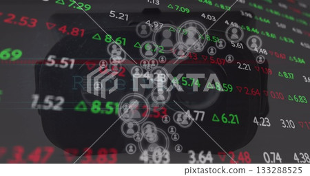 Displaying VR headset with stock tickers green red arrows and user icons in digital interface Displaying VR headset with stock tickers green red arrows and user icons in digital interface 133288525