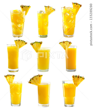 Fresh pineapple juice and ice cubes in a tall glass isolated on white transparent background. 133289280