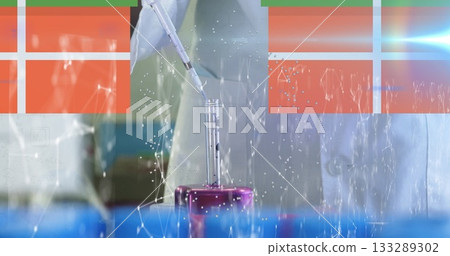 Gloved scientist using micropipette over purple vial stand in lab, with network node overlay 133289302