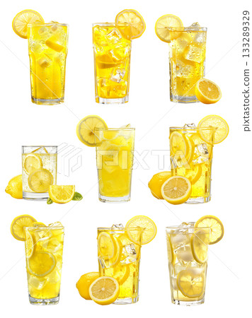 A glass filled with a lemon beverage, ice cubes, lemon slices, and a sprig of rosemary garnishing the drink. 133289329