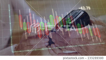 Two seniors studying smartphone with candlestick-chart overlay at wooden table at home Two seniors studying smartphone with candlestick-chart overlay at wooden table at home 133289380
