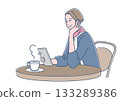 A stylish senior woman is using a smartphone in a cafe 133289386