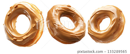 Tasty caramel-glazed donut topped with crunchy nuts, isolated on white transparent background 133289565