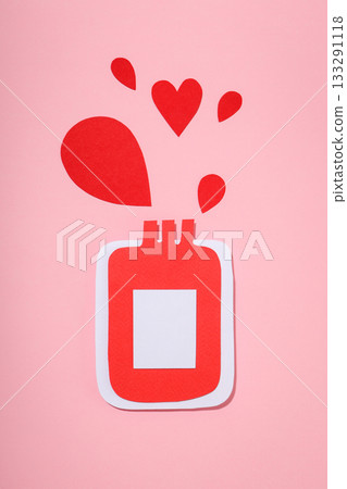 Paper art of a red donation bottle with heart shapes Paper art of a red donation bottle with heart shapes 133291118