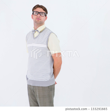 Man posing clasping hands in studio wearing glasses, bow tie, shirt, vest, plaid pants, copy space Man posing clasping hands in studio wearing glasses, bow tie, shirt, vest, plaid pants, copy space 133291665