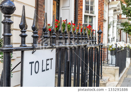 London townhouse with To Let sign on wrought iron railings, rental property market street London townhouse with To Let sign on wrought iron railings, rental property market street 133291886