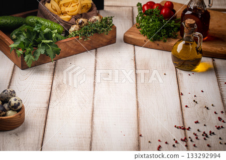 Rustic cooking background with fresh ingredients Rustic cooking background with fresh ingredients 133292994
