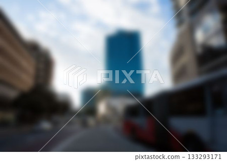 Bus moving on road in city 133293171