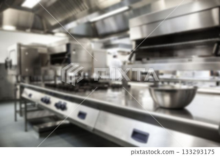 Utensil on stove in commercial kitchen 133293175