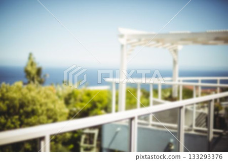 Trees by sea against clear sky Trees by sea against clear sky 133293376