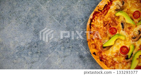 Overhead view of pizza on table 133293377