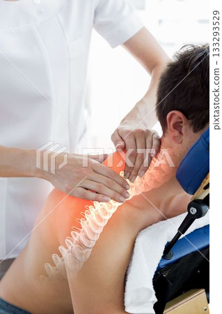 Man with paining shoulder having massage 133293529