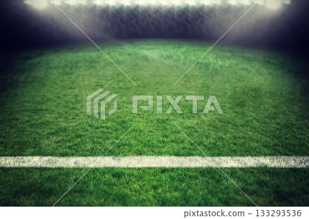 Flat design grass pitch is glowing under floodlights at night, with white boundary line and mist 133293536