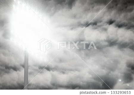 Stadium floodlight fixture is shining through heavy rain and stormy sky in flat design 133293653