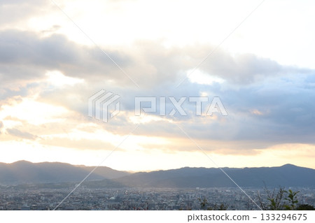 The city at dusk seen from the mountain The city at dusk seen from the mountain 133294675