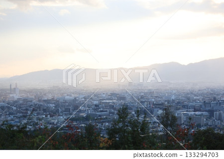The city at dusk seen from the mountain The city at dusk seen from the mountain 133294703