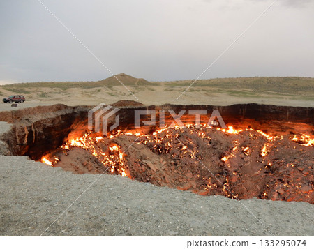 The Darvaza Gas Crater, also known as the Door to Hell in the desert in Turkmenistan The Darvaza Gas Crater, also known as the Door to Hell in the desert in Turkmenistan 133295074