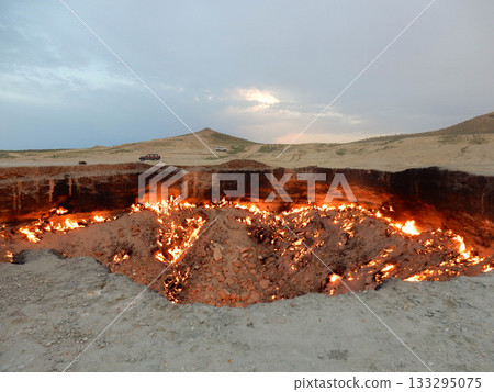 The Darvaza Gas Crater, also known as the Gates of Hell in the desert in Turkmenistan The Darvaza Gas Crater, also known as the Gates of Hell in the desert in Turkmenistan 133295075
