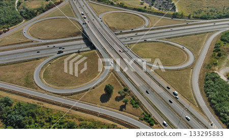 Road interchange or highway intersection. Junction transportation Road interchange or highway intersection. Junction transportation 133295883