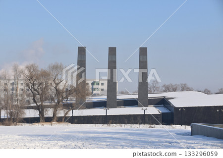 Three large, black Chimneys above the Unit 731 memorial in Harbin, China 133296059