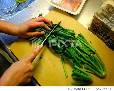 Kitchen cooking vegetables meat cutting woman hand tags Kitchen cooking vegetables meat cutting woman hand tags 133296645