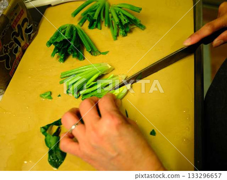 Kitchen cooking vegetables meat cutting woman hand tags Kitchen cooking vegetables meat cutting woman hand tags 133296657