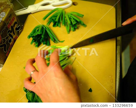 Kitchen cooking vegetables meat cutting woman hand tags Kitchen cooking vegetables meat cutting woman hand tags 133296659