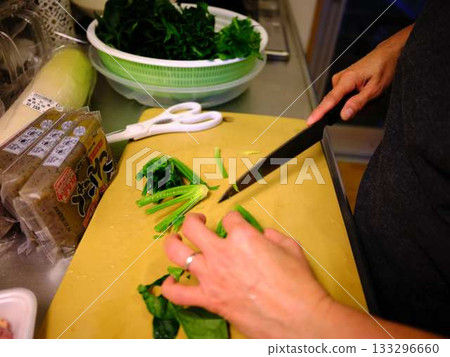 Kitchen cooking vegetables meat cutting woman hand tags Kitchen cooking vegetables meat cutting woman hand tags 133296660