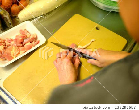 Kitchen cooking vegetables meat cutting woman hand tags Kitchen cooking vegetables meat cutting woman hand tags 133296698