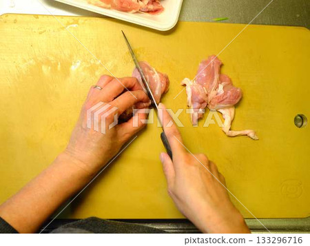 Kitchen cooking vegetables meat cutting woman hand tags Kitchen cooking vegetables meat cutting woman hand tags 133296716