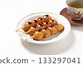 Mitarashi dumplings on a white plate 133297041