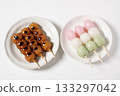 Mitarashi dango and three-colored dango on a white plate 133297042