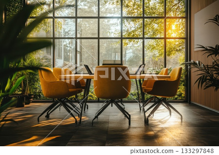 A large, yellow table with six chairs around it is in a room with a large window A large, yellow table with six chairs around it is in a room with a large window 133297848