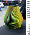 Object printed on 3D printer close up. Model printed on 3D printer from molten plastic. Vase printed on 3D printer from molten plastic. 3D printing technology. Additive progressive FDM technologies 133298483