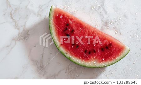 Fresh watermelon slice on marble surface with water droplets. Juicy red fruit wedge with black seeds showing vibrant summer refreshment and healthy eating 133299643