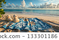Christmas-themed beach towels, sand snowmen, ocean view . 133301186