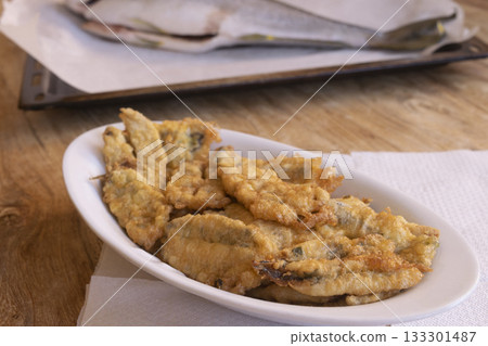 fried anchovy fritters on white plate traditional italian appetizer 133301487