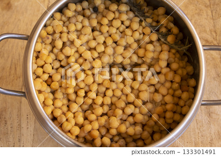 cooked chickpeas with rosemary in stainless steel pressure cooker pot cooked chickpeas with rosemary in stainless steel pressure cooker pot 133301491