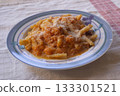 pasta with tomato sauce and parmesan cheese 133301521