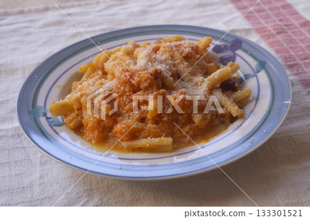 pasta with tomato sauce and parmesan cheese 133301521